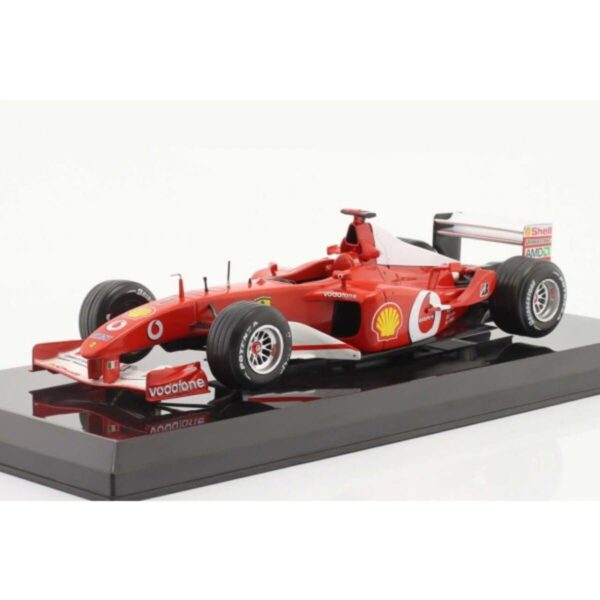AUTO A ESCALA 1:24 MICHAEL SCHUMACHER FERRARI F2002 #1 WORLD CHAMPION